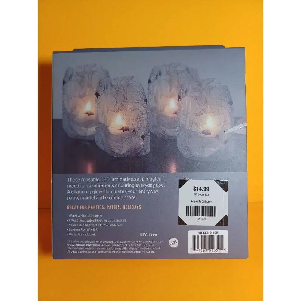 Glowing LED Lanterns With Floating Flameless LED Candles Luminaries Set of 4 NEW
